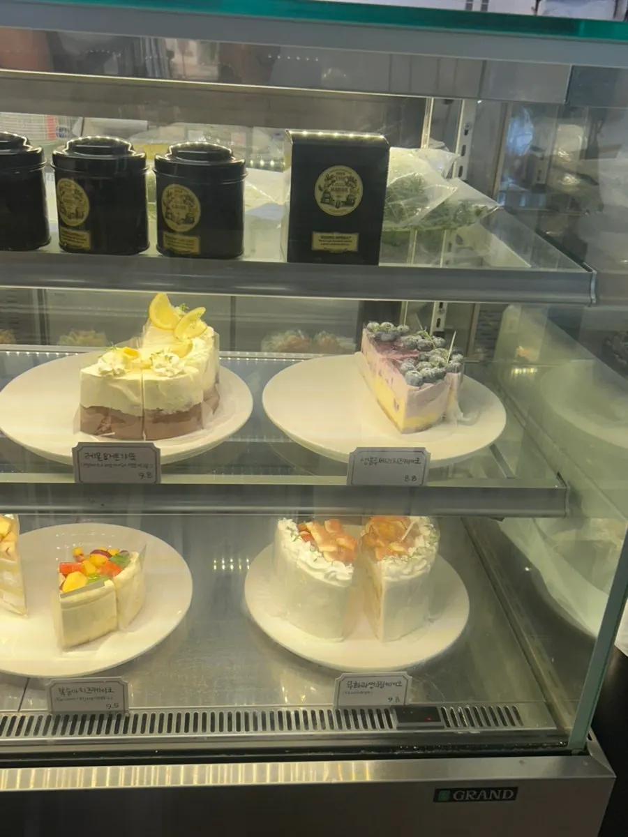 Fruit sando and slice cakes on display