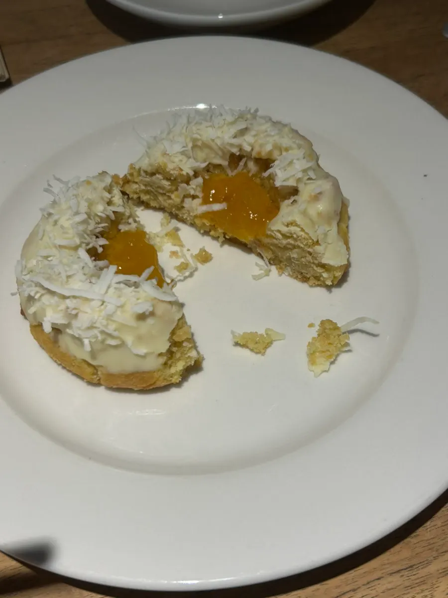 Close-up of the pineapple cookie dusted with coconut