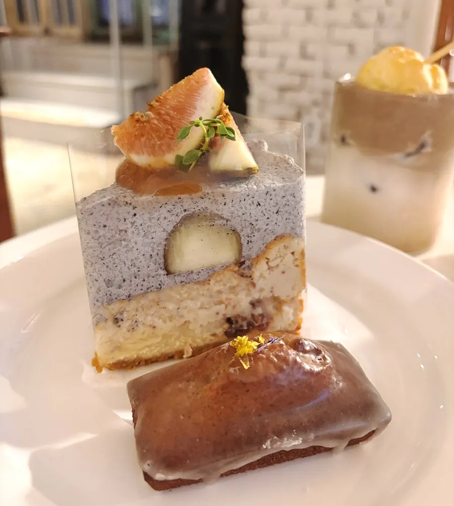 A slice of fig black sesame cheesecake