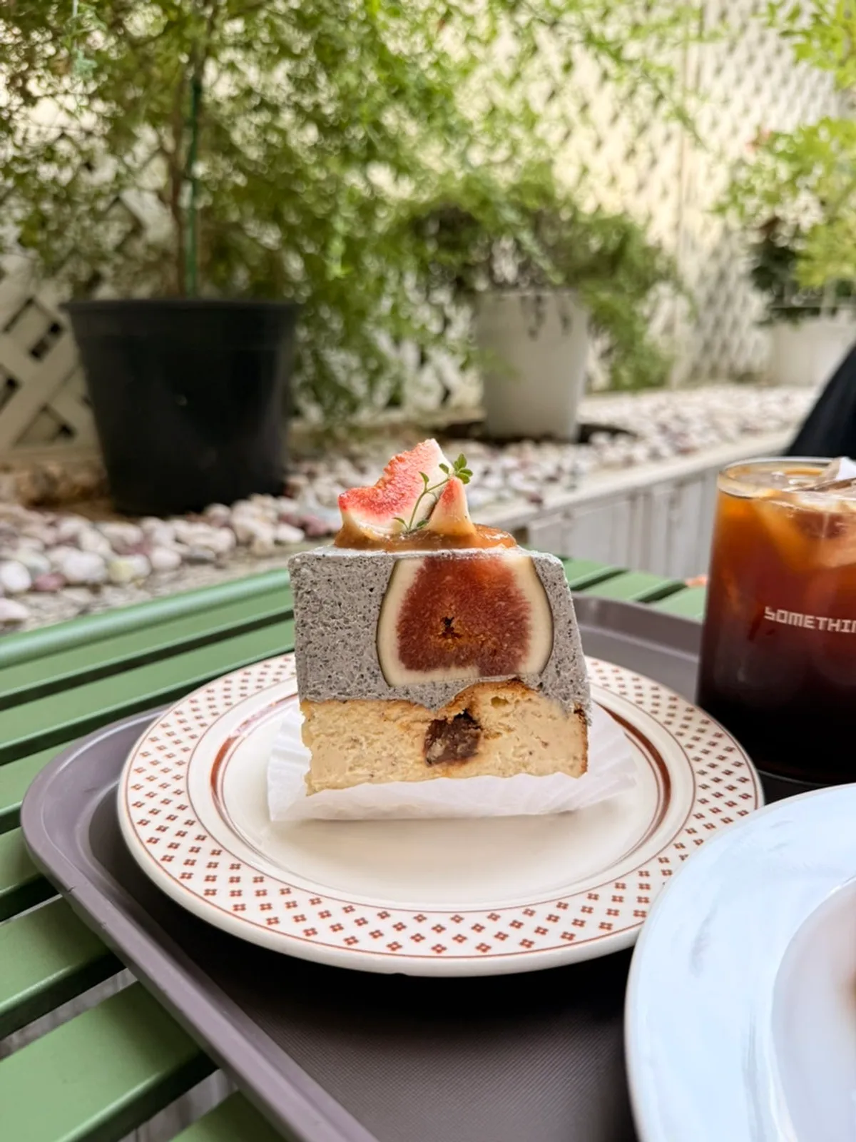 Coffee and dessert set up on a terrace table
