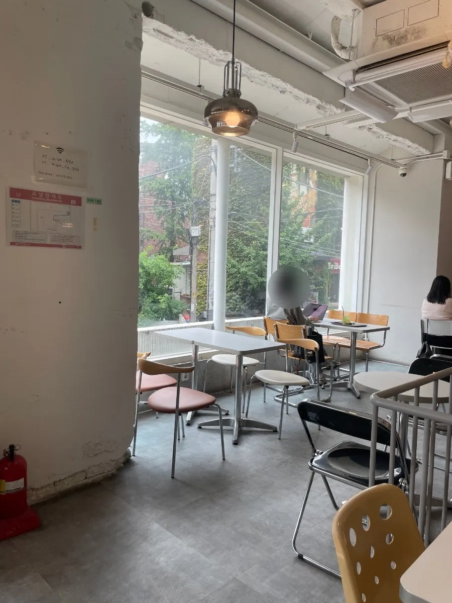 Area around the 2nd-floor order counter at Something About Coffee