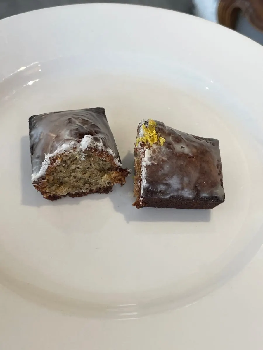 Lemon Earl Grey financier with a drink
