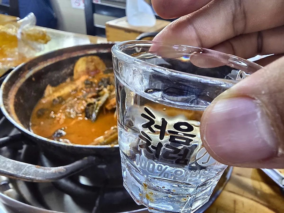 Soju enjoyed alongside the gamjatang