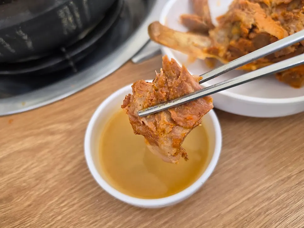 Close-up of meaty gamjatang pork bones