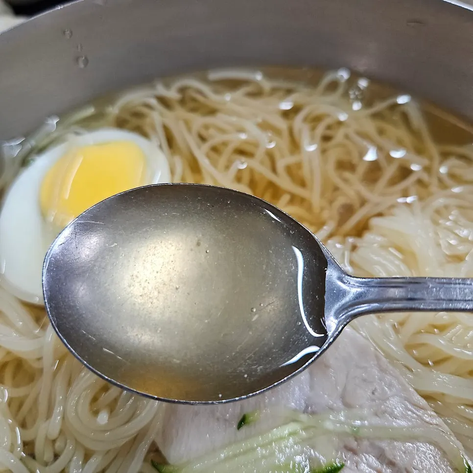 Double portion milmyeon noodles mixed into the broth