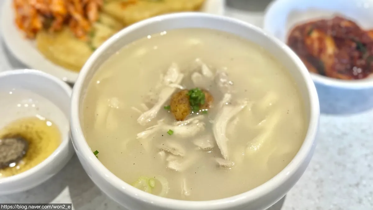 A bowl of chicken kalguksu at Songa Kalguksu