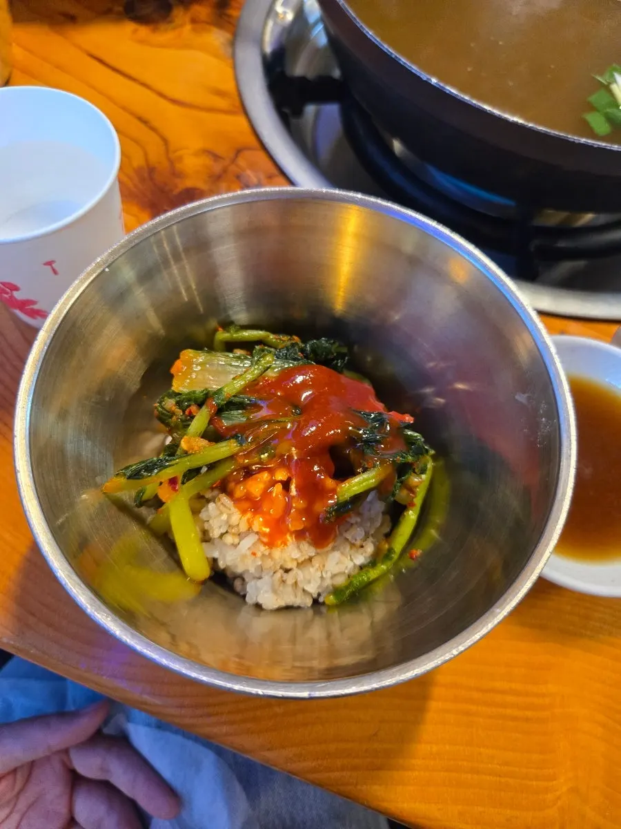Table set with octopus kalguksu and beef kalguksu order