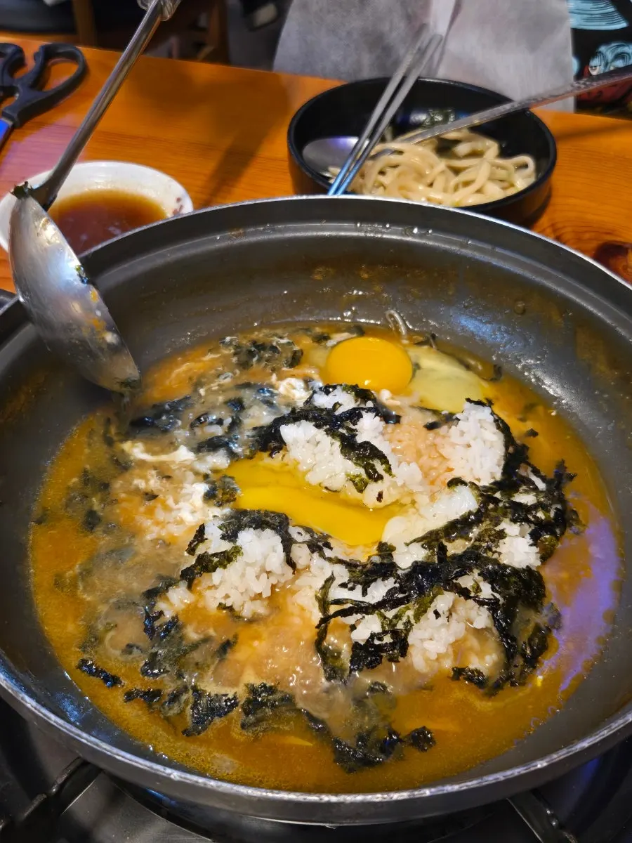 A bowl of kimchi gulrim mandu