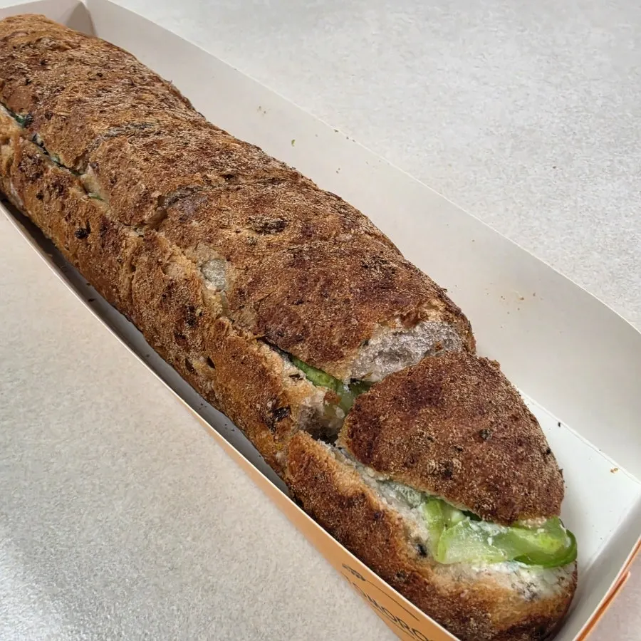 Cucumber baguette filled with cream cheese