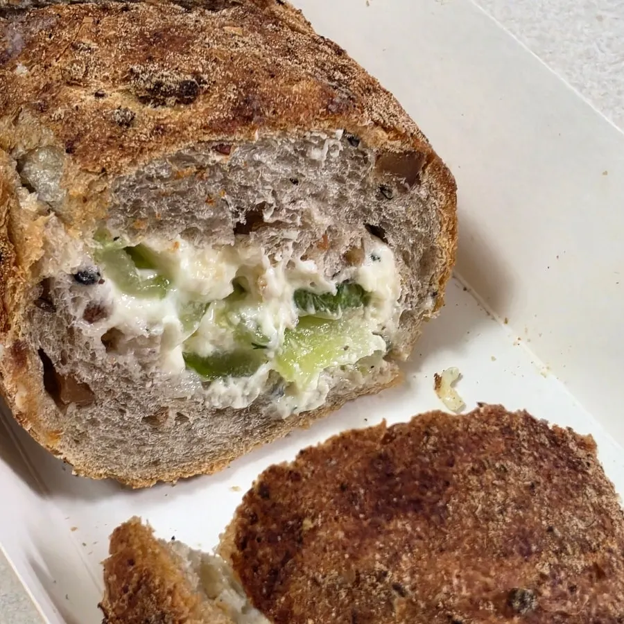 Cross-section of the end piece of the basil tomato baguette