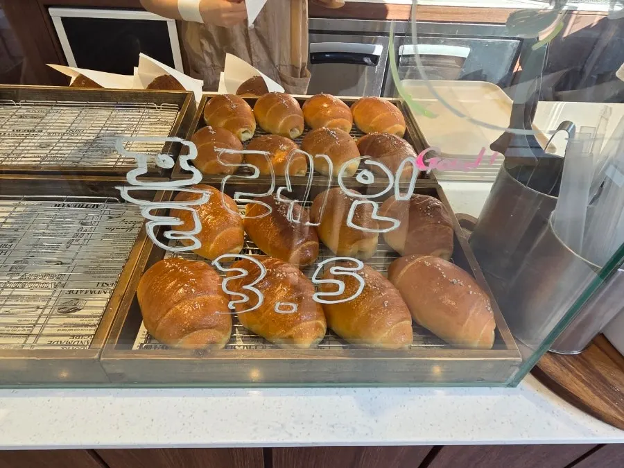 Display shelf showing sold-out popular salt breads