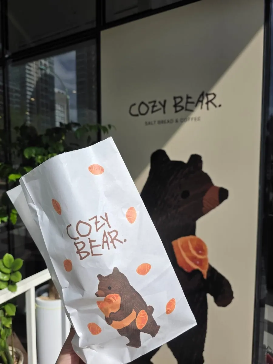 Cozy Bear café menu board with coffee and non-coffee options