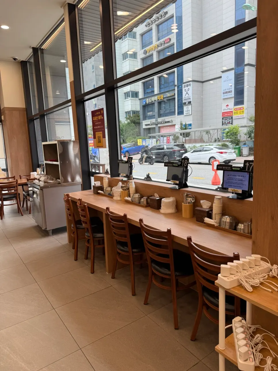 Table with a high chair placed beside it