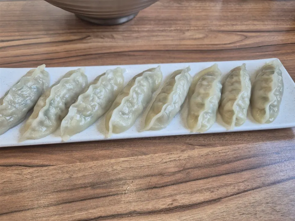 Eight pieces of chewy mandu on a plate