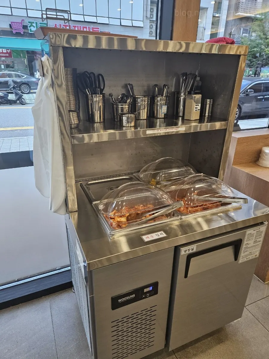 Self-serve bar with aprons, scissors, and small plates
