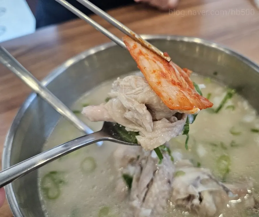 Mid-meal shot of the chicken kalguksu bowl