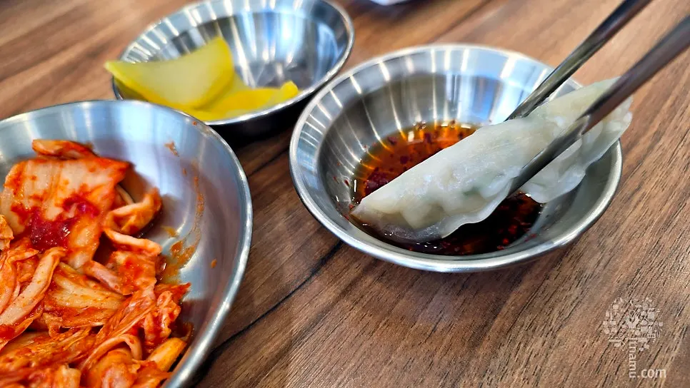 Chewy dumplings and house soy sauce