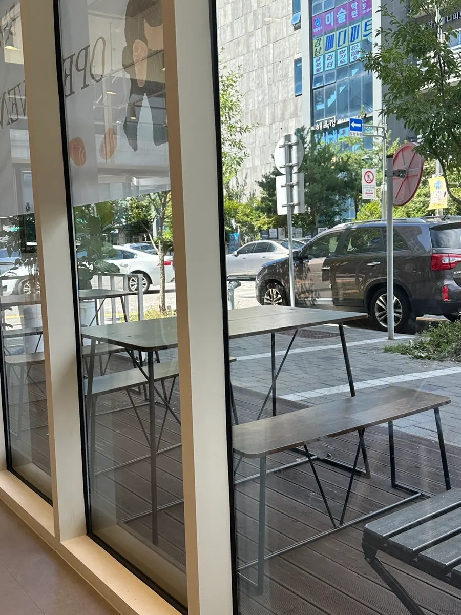 Outdoor terrace seating at Cafe Cozy Bear