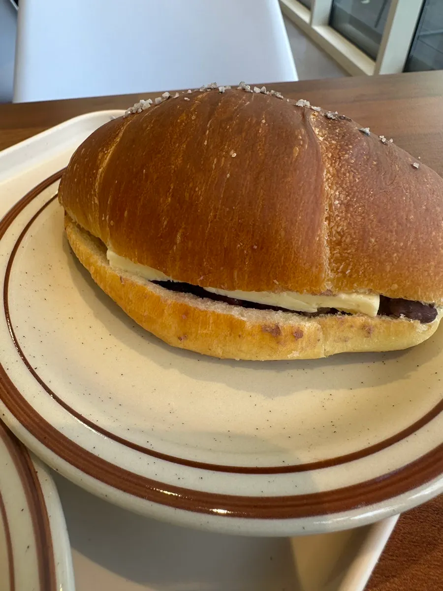 Rich iced latte with salt bread for a morning set