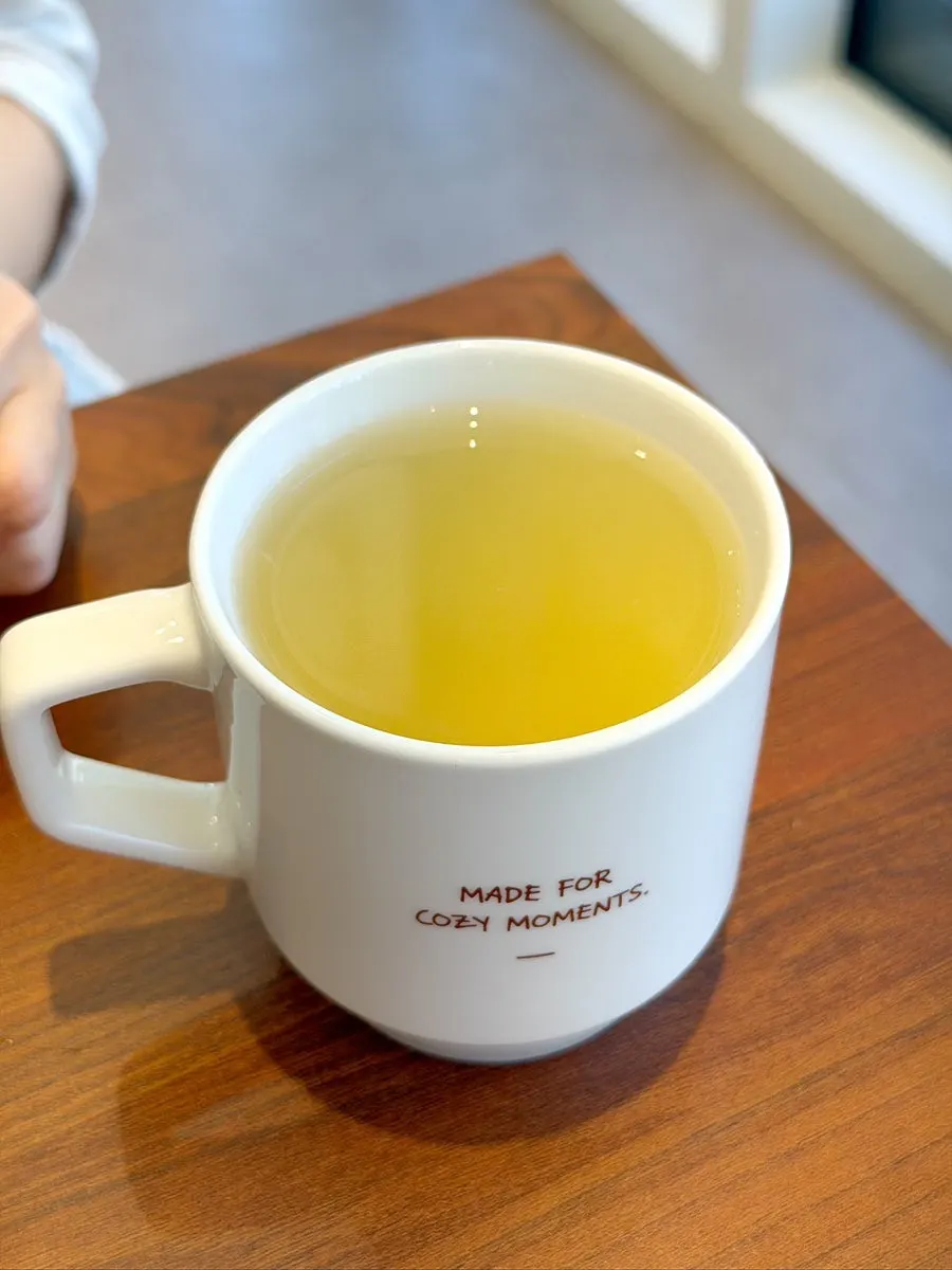 A cup of Cozy Bear's hot yuja tea