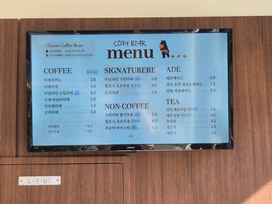 Interior of the store with salt bread and coffee signage