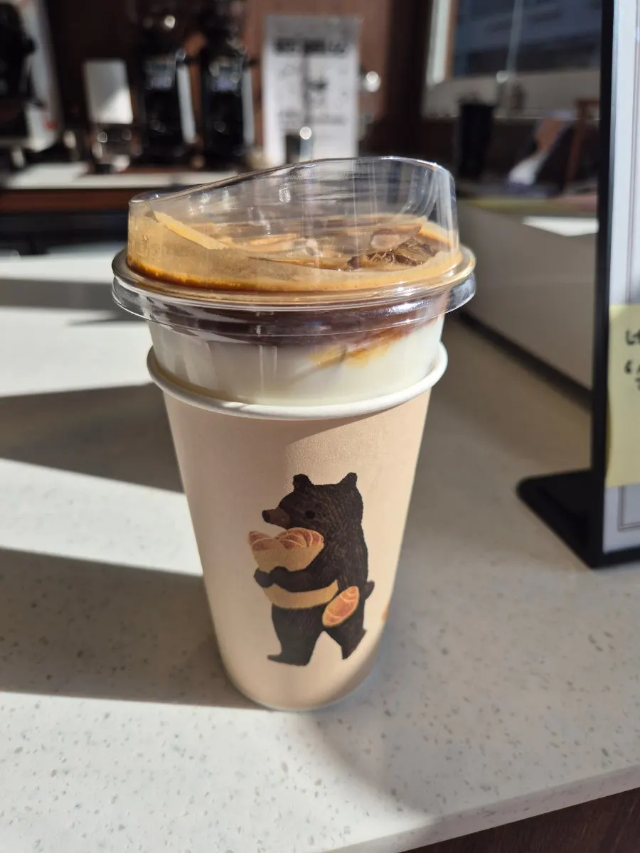 Cozy latte packaged for takeout