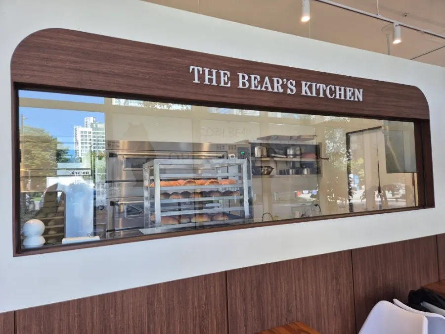 Cafe Cozy Bear interior in beige and wood tones