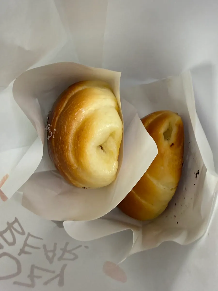 Side view of plain salt bread showing its soft texture