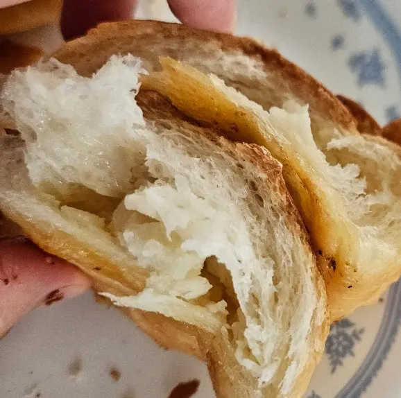 Tasting the Cozy Bear mentaiko salt bread inside the car