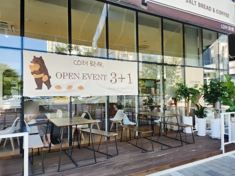 Sign for Cozy Bear's opening event: buy 3 get 1 free salt bread