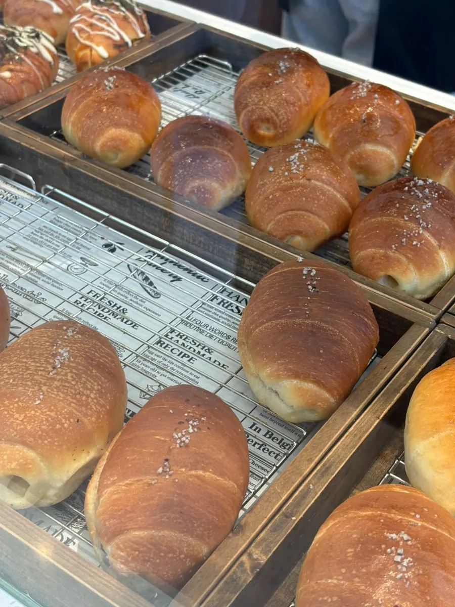 Display of assorted salt breads inside the shop