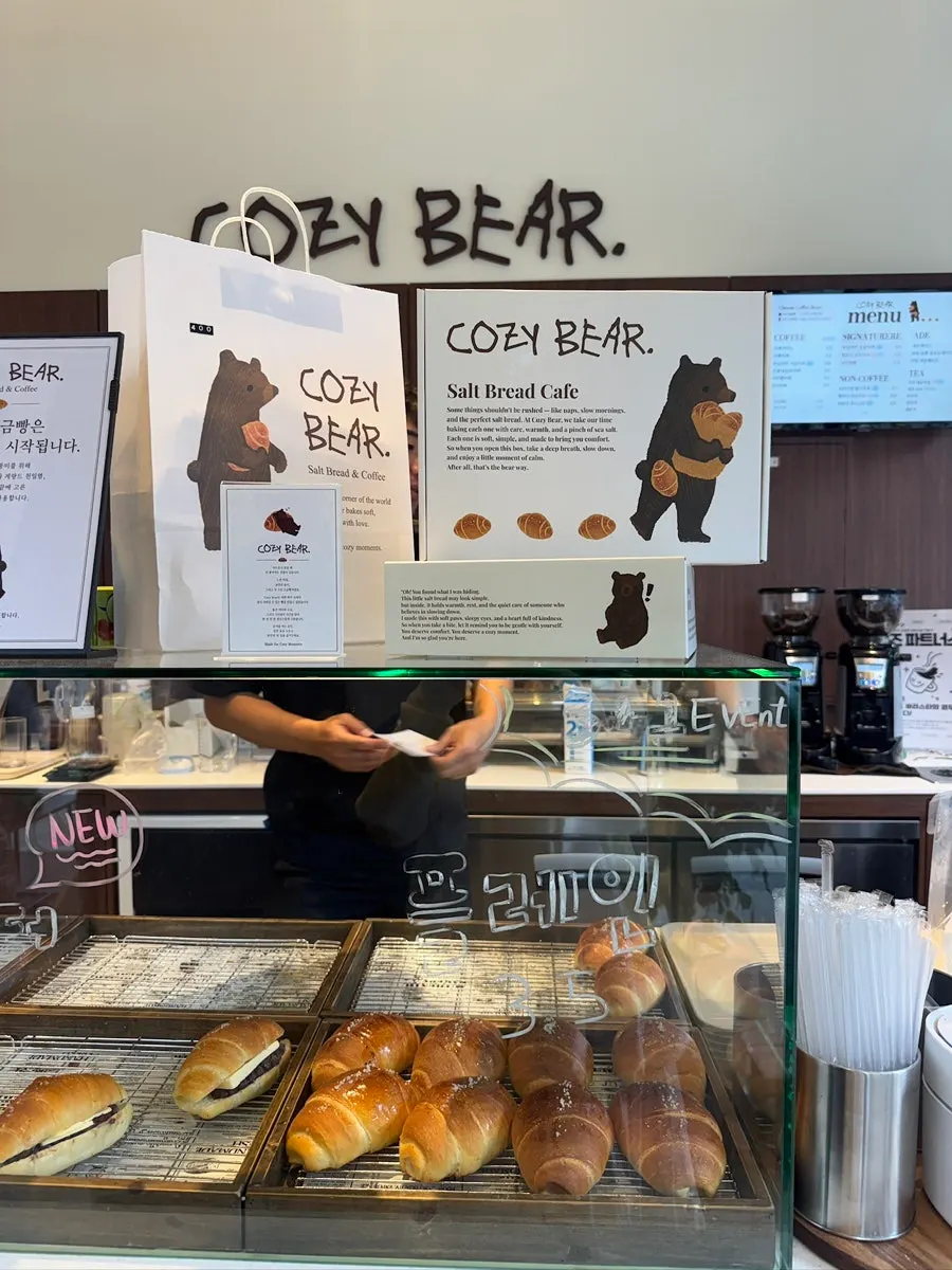 Indoor tables and cozy atmosphere at Cafe Cozy Bear