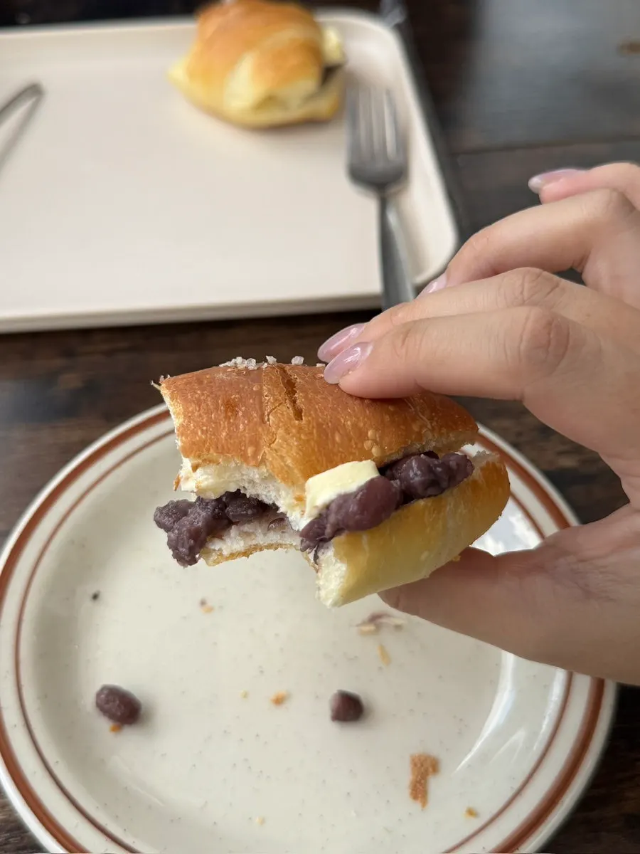 Cross-section of the red-bean-butter salt bread showing red bean and butter