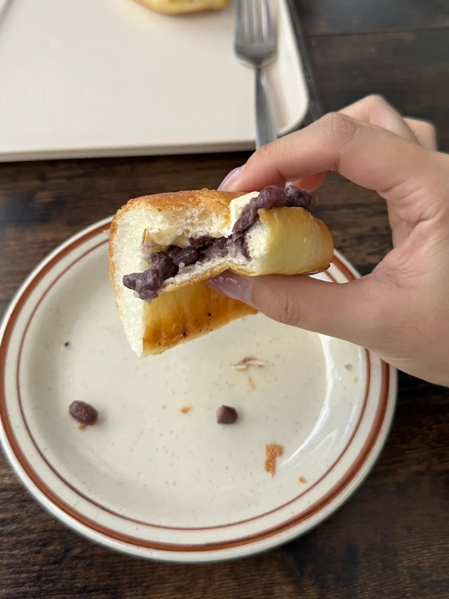 Holding the red-bean-butter salt bread