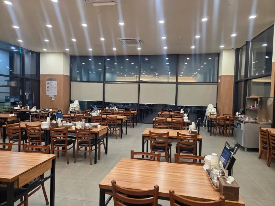 Interior of Eonyang Dak Kalguksu with plenty of tables