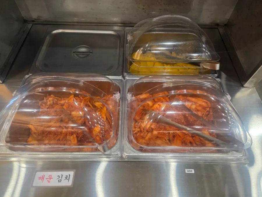 Self-serve bar with a note about house-made kimchi