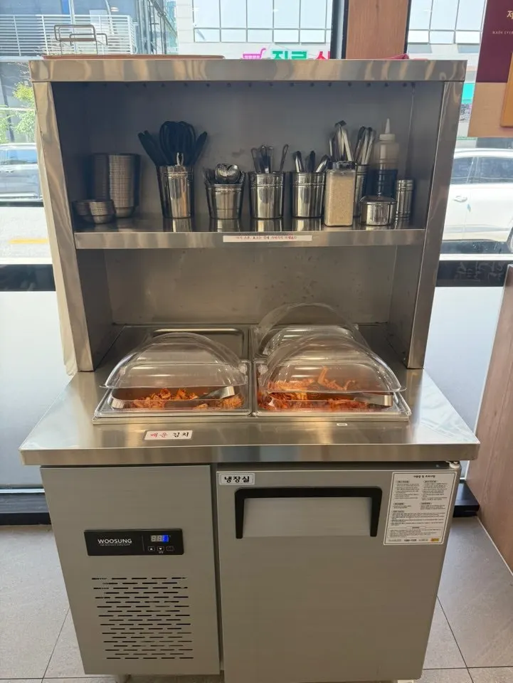 Self-service bar with spicy and mild kimchi