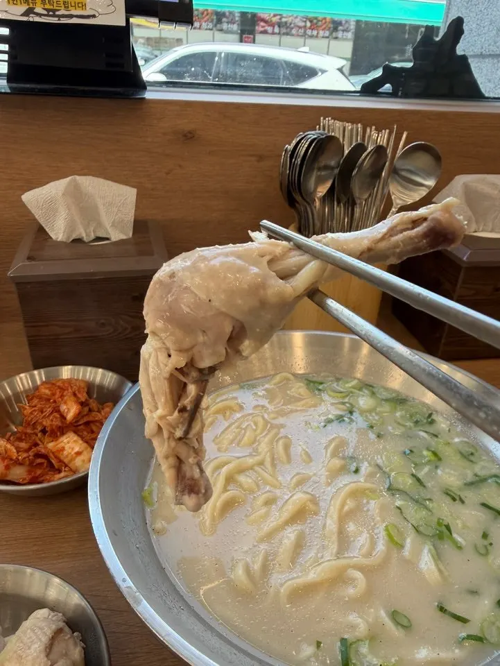 Tender chicken leg meat pulled onto a side plate