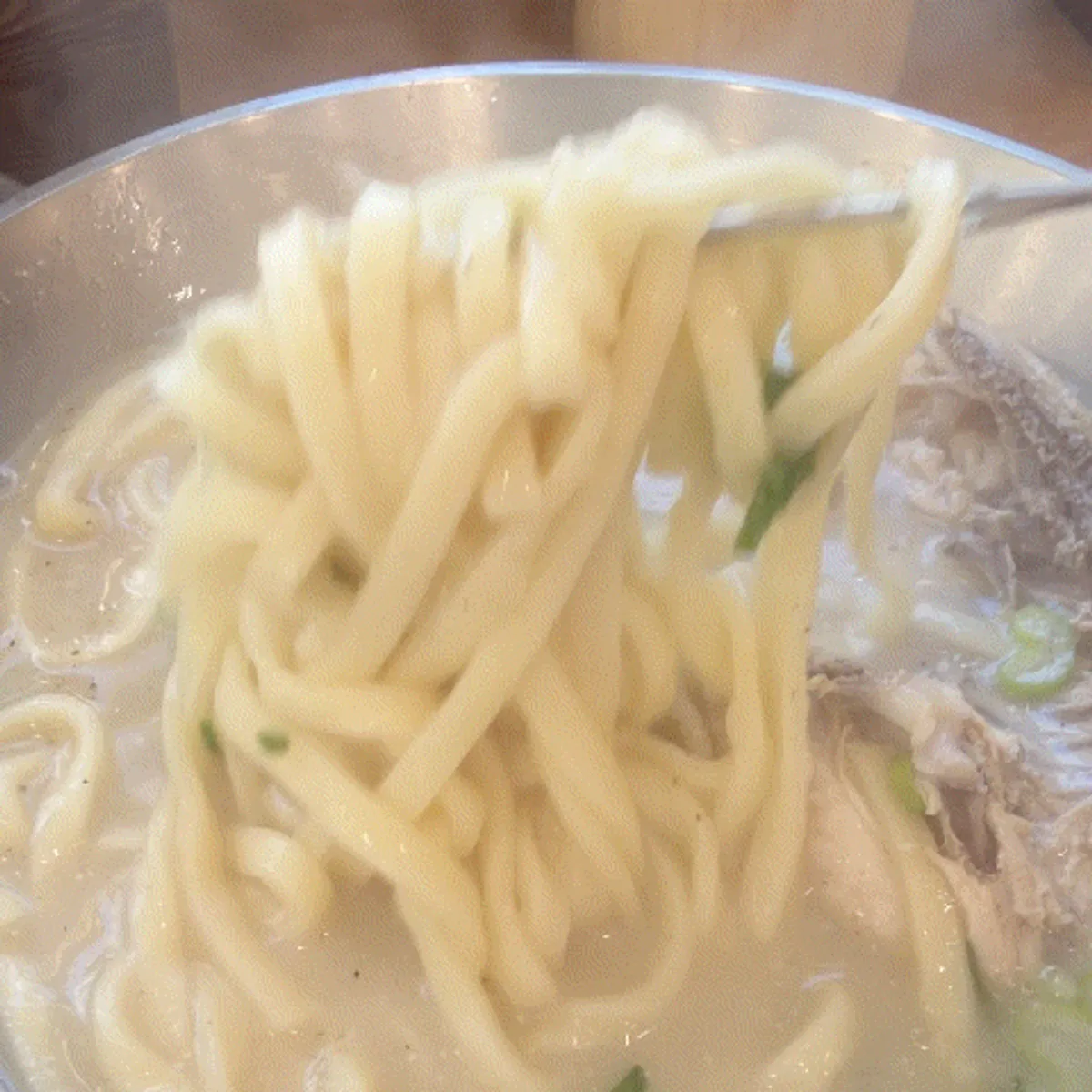 Thick handmade kalguksu noodle strands