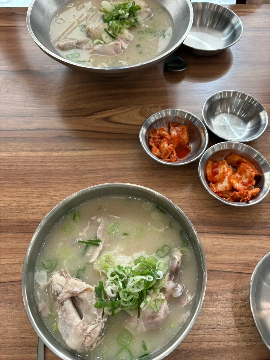 Perilla-based chicken gomtang with a bowl of rice