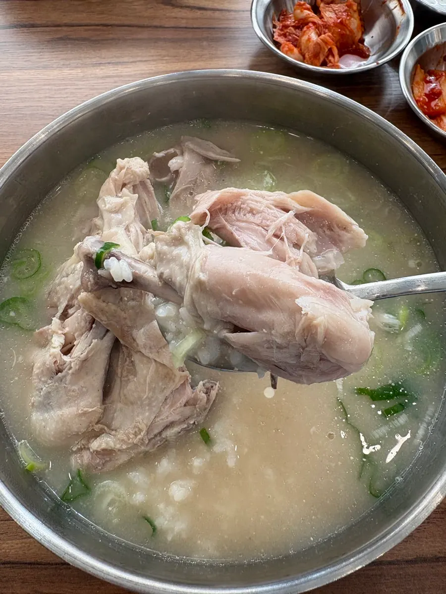 Chicken gomtang broth with half a chicken