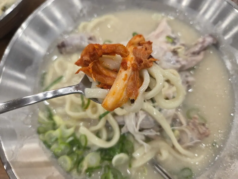 Spicy silbi kimchi scooped from the self-serve bar