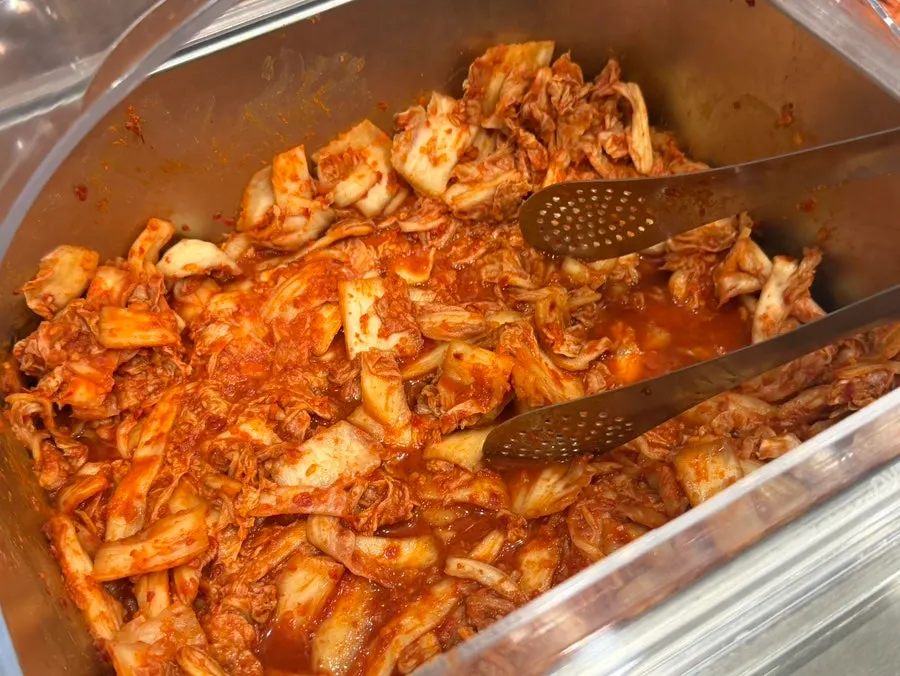 Kimchi served with chicken kalguksu