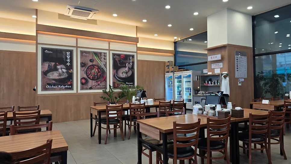 Spacious dining hall interior under soft lighting