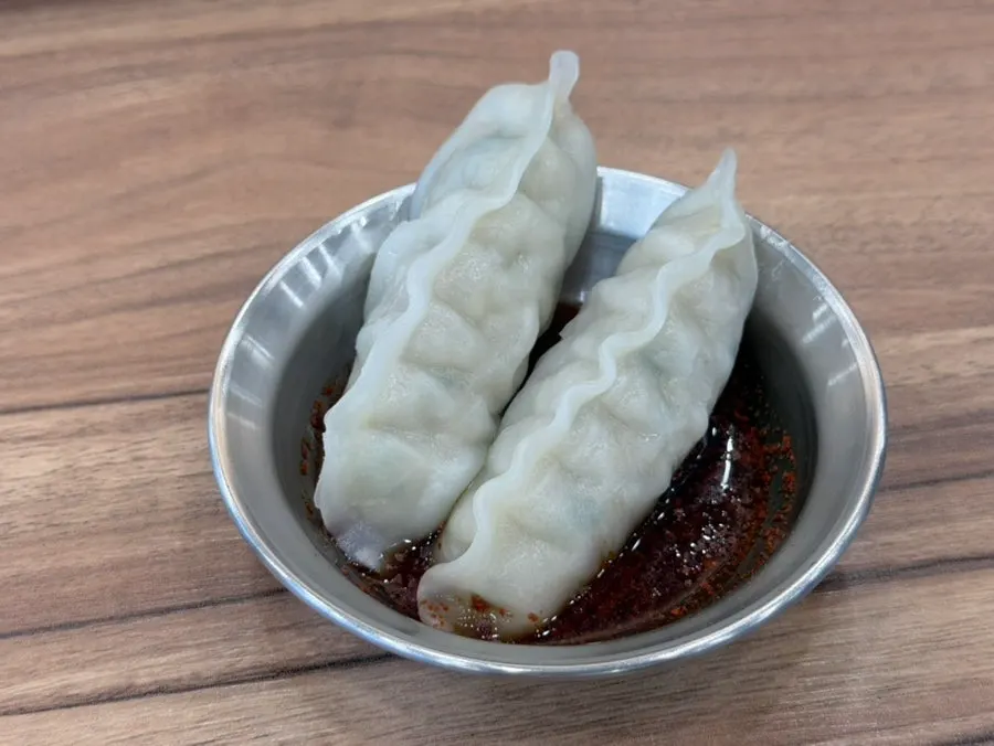 Chewy mandu dumplings with a thin, translucent potato-starch skin