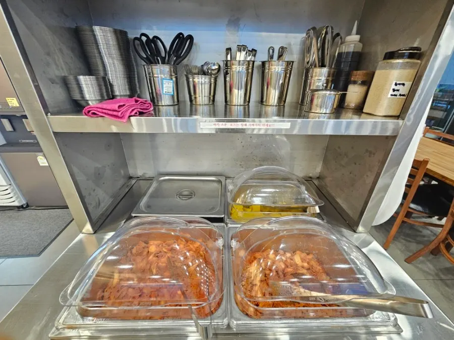 Self-serve bar with mild and spicy kimchi