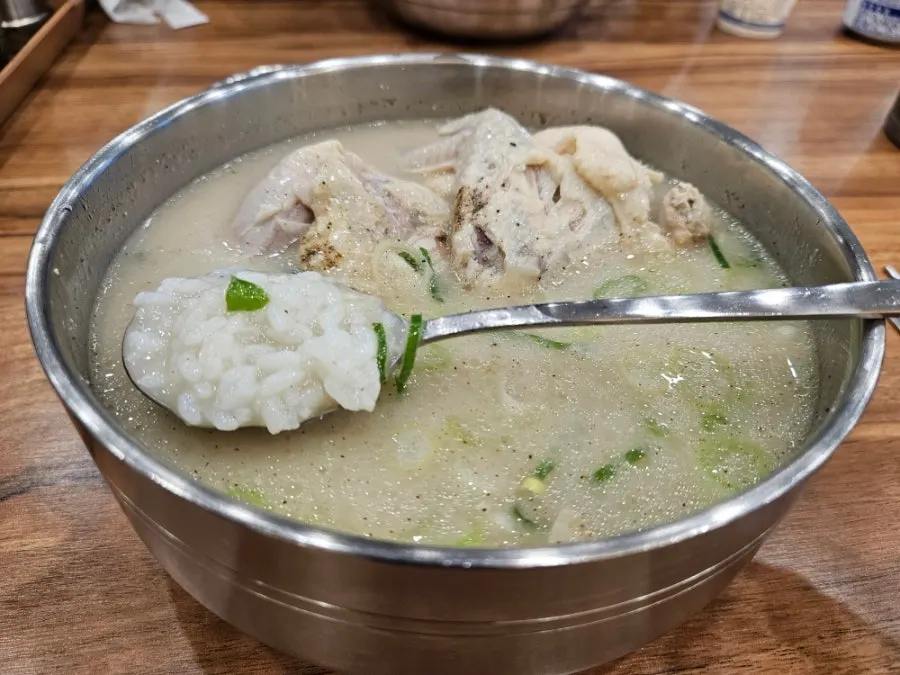 Dak gomtang broth with rice already mixed in