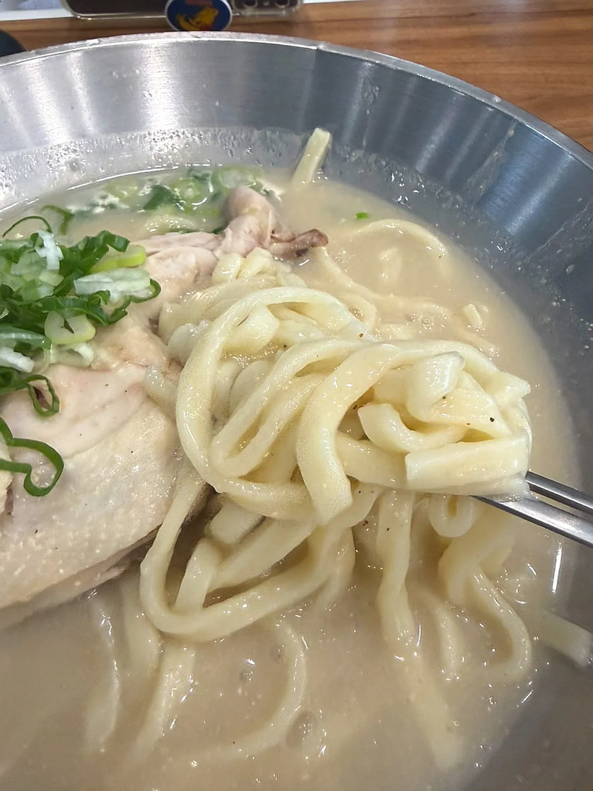 Dak kalguksu served in a large bowl