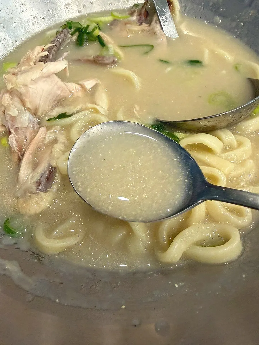 Tender chicken meat pulled off the bone