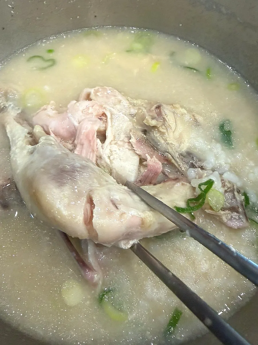 A big chicken drumstick inside the dak gomtang